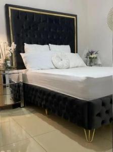 Elevate Your Sleep with High Headboard Ottoman Bed. shop now