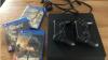 PS4 Slim 500GB with 2 controllers and 3 games