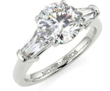 Elegant Round and Baguette Trilogy Ring – Timeless Beauty