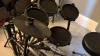 Alesis Nitro Mesh drum kit with stool and amp