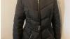 Belted puffer long black jacket with fur trim